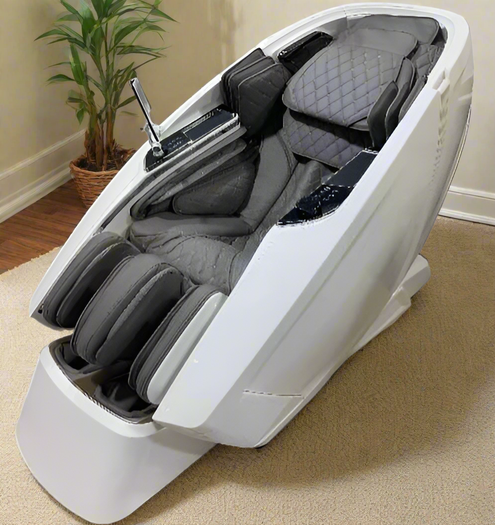 White massage chair with gray cushions on a white background
