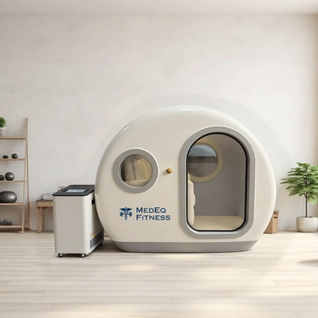 White hyperbaric pod with 'Medeq Fitness' branding in a modern room.