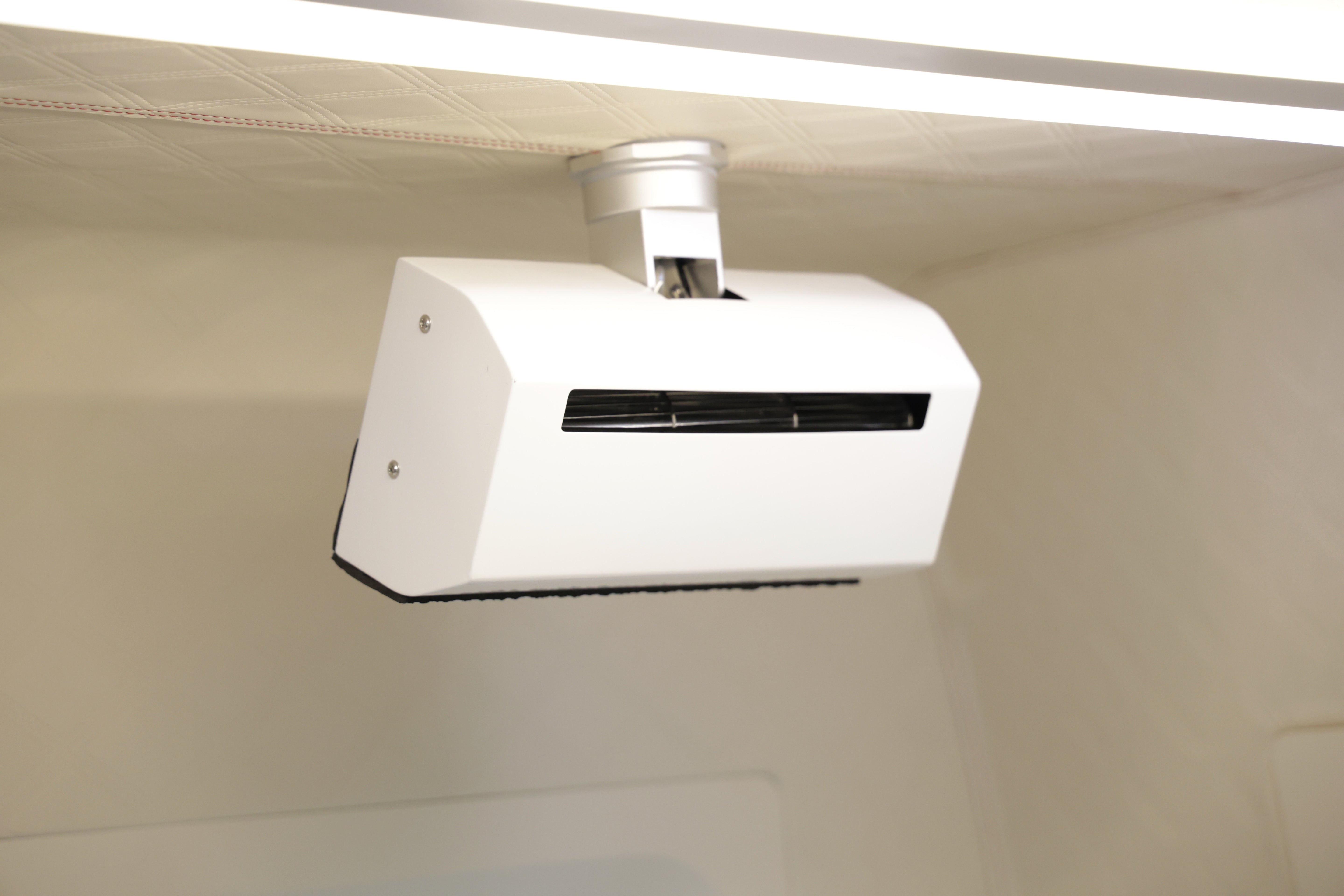 Ceiling-mounted air conditioning unit in hyperbaric chamber